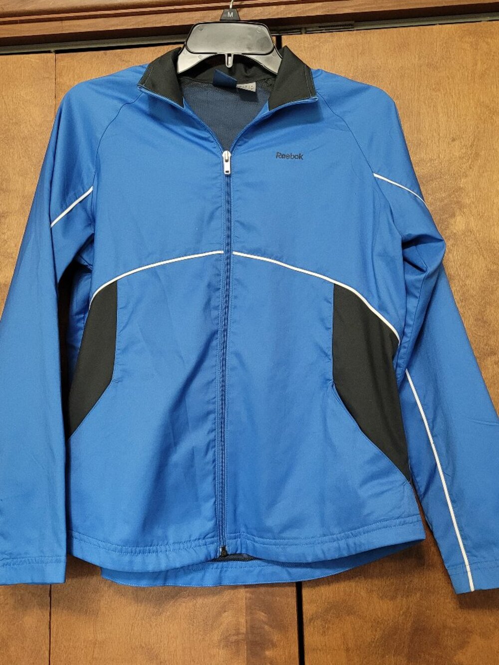 Reebok blue lightweight windbreaker. Size Small